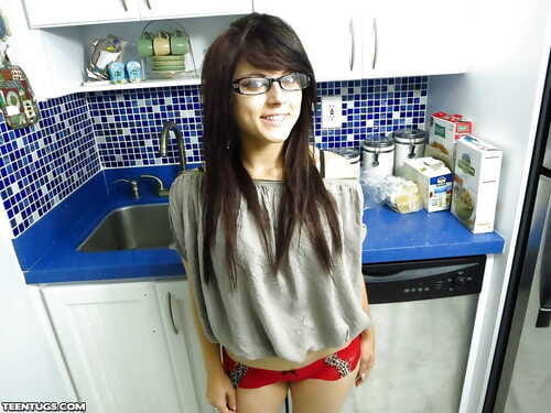 Smiley teenage fox in glasses slowly uncovering her seductive curves