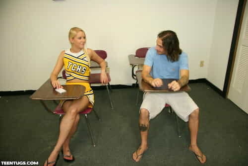 Blonde cheerleader Vanessa Cage flashes tits before jerking off a guy in class