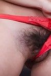 Alisia shows off her hairy pits early during the time that curled up on the sofa. Stripping from her orange dress to her lingerie, her hairy pussy is shown off halfway through. She\'s wild and frisky as that babe strips.