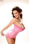 Classy vintage babe Denise posing and teasing in pink corset