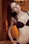 Skinny young girl Juliett Lea removing lingerie to plunge fingers into snatch