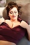 Candid shots of busty Leanne Crow in purple satin