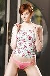 Short haired redhead in pink panties unveiling total all natural breasts
