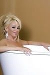 Beautiful curvy blonde, Rachel Aziani, is a dream bathing in the nude in her outdoor tub and posing for the camera!