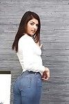 Teen babe Leah Gotti poses dressed in jeans before baring phat waste and love melons