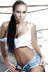 Elegant brunette hair Vivien way entirely dressed in short underclothing and white dominant