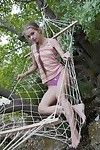 Barefoot youthful Milena D disrobes cotton shorts to play with dick in the forest
