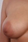 Large wife with huge breasts posing