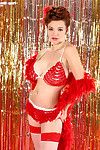 Breasty Danielle Riley standing as a burlesque dancer