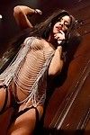 Latin beauty centerfold beauty Jessica Burciaga showcasing her seductive bows