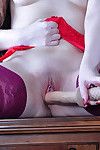 Upskirt girl in purple stockings with a red girdle finds a equipment for her equipment box