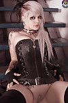 Wild tattooed elegant waste goth in leather corset