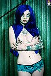 Blue haired appealing and tattooed gothic gal