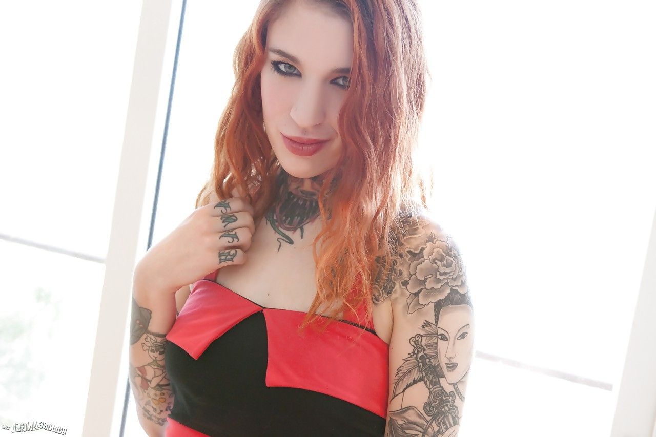 Tattooed Redhead Mabel Baring Her Perk Tits And Fingering
