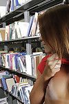Giant butt dark brown darling Emma getting nude and flashing in a library