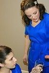 Enchanting dark hair beauty teaching her younger associate how to jack off a phallus