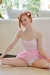 Slender redhead youthful in ballerina outfit jamming fake penis up pink cage of love