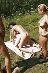 Breathtaking coeds have fun groupsex all together with lascivious boyz outdoor