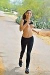 Juvenile jogger freeing milk sacks from sports brassiere outdoors previous to anal fingering