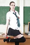 Uniformed schoolgirl Connie Carter is posing in hot high heels