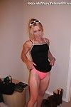 Fairy slight housewife posing in pinky shorts in the bedroom