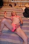 Fairy slight housewife posing in pinky shorts in the bedroom
