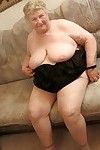 Curvy bare old woman play