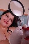 Buxom BBW instance Karla posing as perverse nurse and letting major hooters loose
