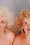 Dirty-minded 19 lesbian babes perform foursome posing scene with excited grannies