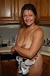 Aged Ivee showing off tattoos and skinhead seasoned slit in kitchen