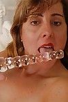 Ripened sucks her palatable glass marital-device and sleeps with clammy pink cum-hole on livecam