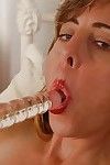 Ripened sucks her palatable glass marital-device and sleeps with clammy pink cum-hole on livecam