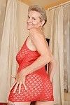 Lusty aged with giant saggy jugs undressing and exposing her love-cage