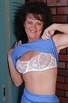 Nasty older Debella shows off her saggy love bubbles in the changing room