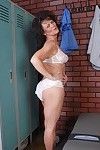 Nasty older Debella shows off her saggy love bubbles in the changing room
