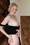 Full-grown Euro woman Anya Volcov posing non as mother gave birth in brown nylons and suit