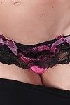 Aged lady Ashley Brooke undressing for baring of saggy bra buddies and shaved muff