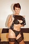 Short haired established in  striptease off her costume and underware