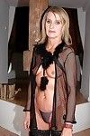 Slender elderly in nylons delightful off her underclothes and toying her fur pie
